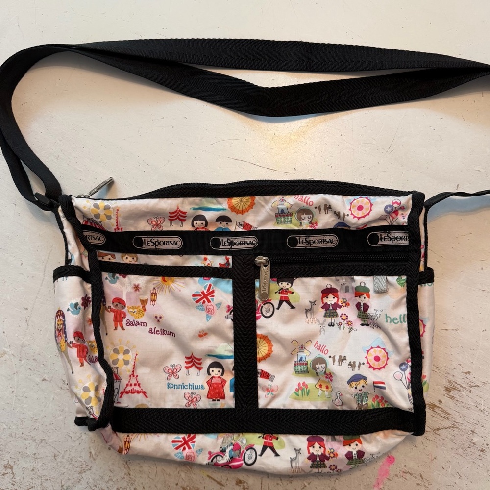 Disney- It’s a small world LeSportsac White Multi-Color Printed Crossbody Bag